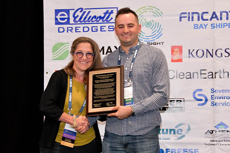 Project Manager Charlie Stein accepting the award